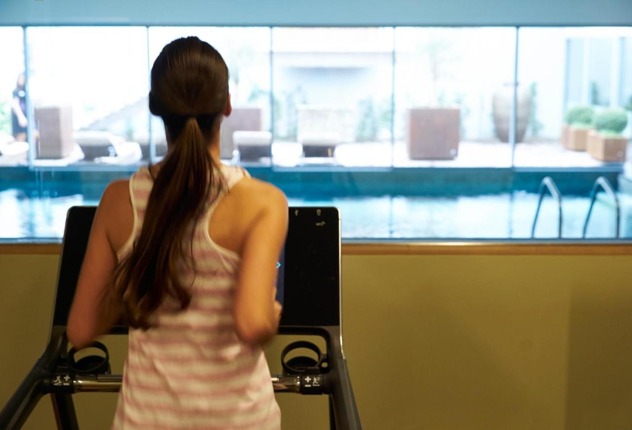 Portobay Liberdade Hotel Lisbon Exterior photo A woman on a treadmill