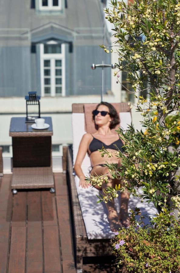 Portobay Liberdade Hotel Lisbon Exterior photo A woman sunbathing